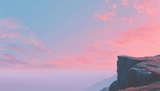 A person standing on a cliff overlooking the ocean photo