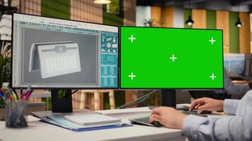 Close up of technician using green screen mockup PC to create solar powered device design with green energy. RD expert uses chroma key computer, creating eco solar gadget prototype, camera A video