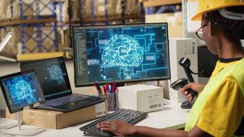 African american woman uses AI deep learning software for e-commerce automation, working in distribution hub with neural networks brain managing tracking software. Data science. Camera B. video