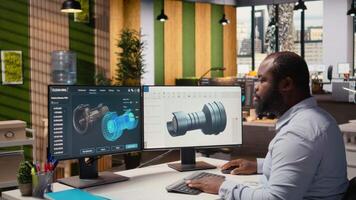 ingenjör i kontor arbetssätt på vind turbin cad design till utveckla teknologi förbättra miljö- prestanda. rd expert- kommande upp med innovativ material för vind energi generator, kamera en video