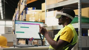 Black staff uses VR glasses for 3D simulation powered by artificial intelligence, supporting order fulfillment and inventory control. Person monitoring parcel tracking for shipment. Camera B. video