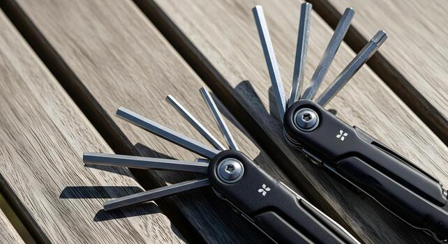 Cycling concept without people featuring multitool opened to hex and torx shapes, set in trailhead table, suitable for fitness, health and training stories, editorial safe. photo