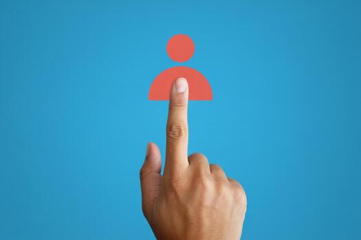 Hand selecting a person icon on a touchscreen interface, symbolizing recruitment, hiring, and human resources processes in a digital workspace photo