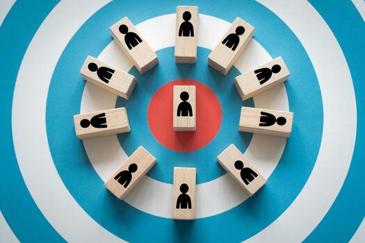 Teamwork, Targeting, and Collaboration Wooden Blocks Arranged on a Target Representing a Focused Team Working Together to Achieve a Shared Goal photo