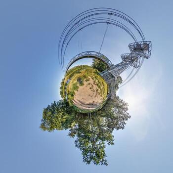 Abstract view of little planet transformation of spherical panorama, 360 degrees. Spherical abstract aerial view on steel frame and concrete construction huge pedestrian bridge. Curvature of space. photo