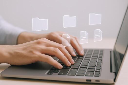 Person Typing on Laptop with File Management Icons, Illustrating Digital Organization and Productivity photo