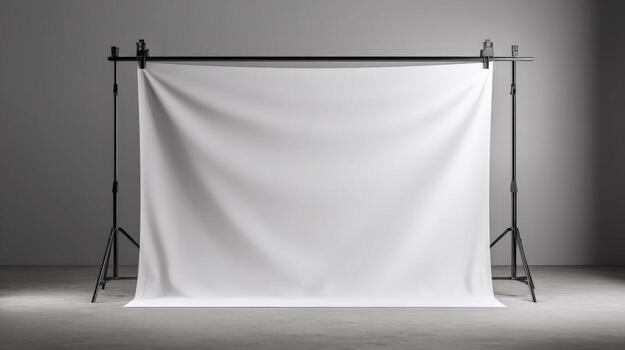Studio Backdrop Setup with White Fabric and Tripod Stands, Ideal for Portrait Photography photo