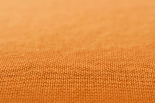 Textured Orange Fabric Close-Up Versatile Textile Background for Graphic Design and Mockups, Featuring Neutral Warm Tone photo