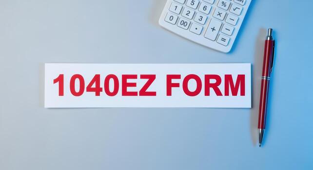 Tax Form on Desk with Calculator and Pen Represents Financial Paperwork Overhead View photo