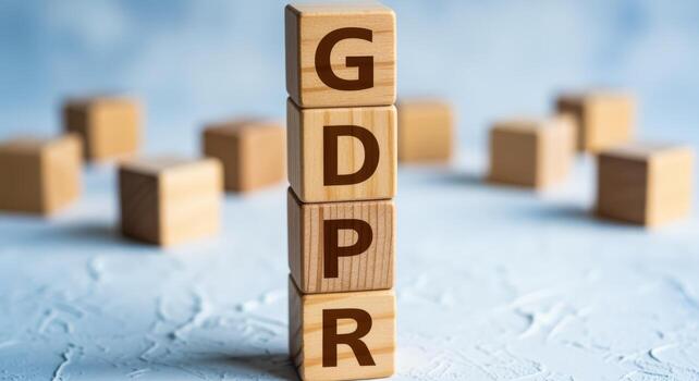 Wooden Blocks Spelling GDPR for Data Protection and Privacy Regulations Concept on Concrete Background photo