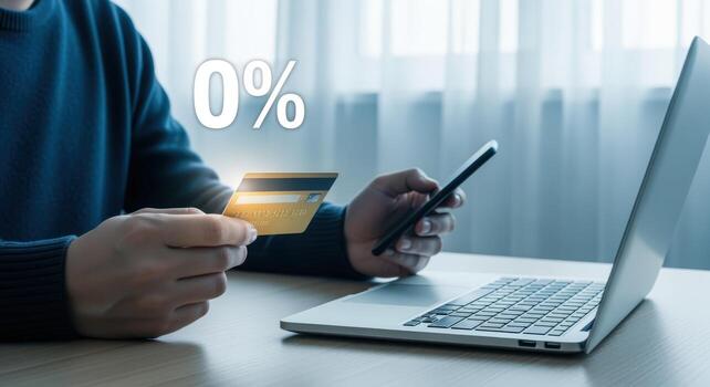 Online Shopping with Zero Percent Interest Man Holding Credit Card and Using Smartphone for Secure Payment photo