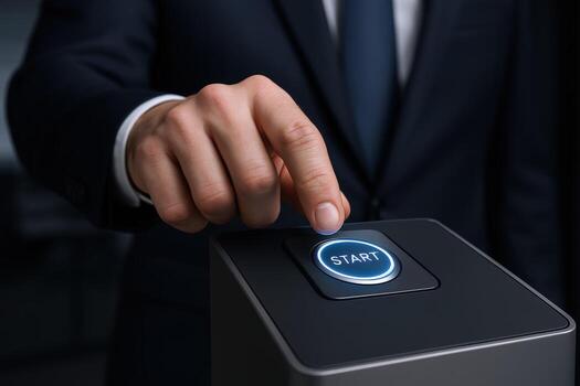 Businessmans Finger About to Press Start Button, Symbolizing Initiative, Innovation, and a Fresh Beginning photo