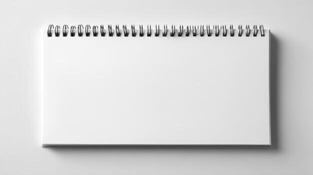 Blank Spiral Notebook Mockup on White Background Ideal for Designs, Sketches, and Presentations photo