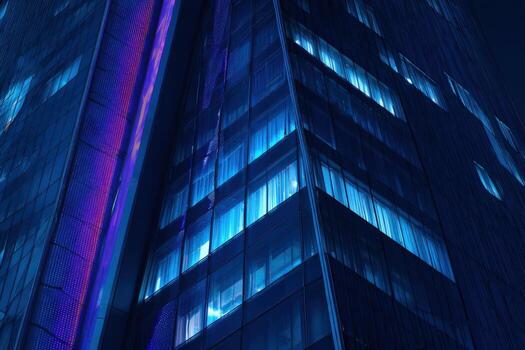 Modern Architecture Abstract View of Illuminated Office Building at Night with Blue and Purple Lights photo