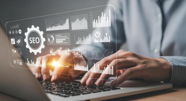 Hands Typing on Laptop with SEO Data Analytics Overlay for Business and Marketing photo