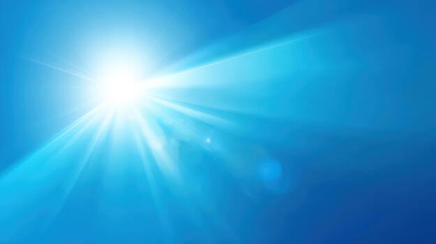 Bright Sunlight Rays Shining Through Blue Sky Background, Creating a Lens Flare Effect and Beautiful Light photo