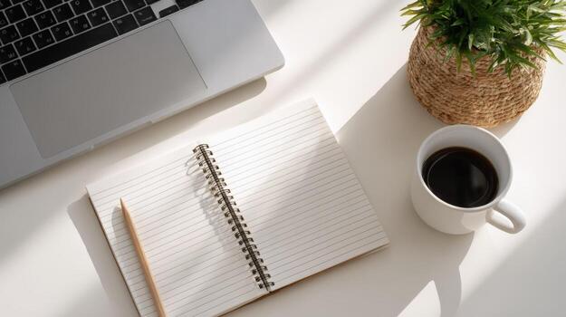 Bright Workspace with Laptop, Notepad, Coffee, and Plant for Remote Work Concept photo