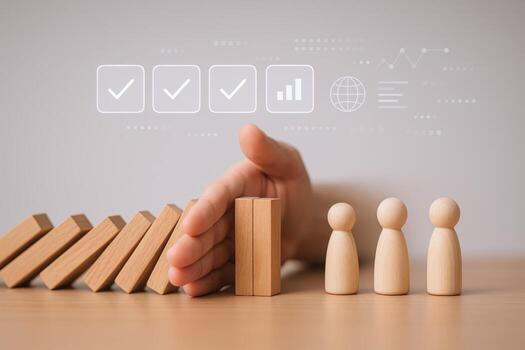 Risk Management Strategy Hand Stopping Domino Effect with Checkmarks, Protecting Business Investments and People photo