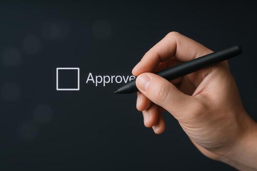 Approval Concept Hand with Stylus Hovering Over Checkbox on Black Background Signifying Agreement photo