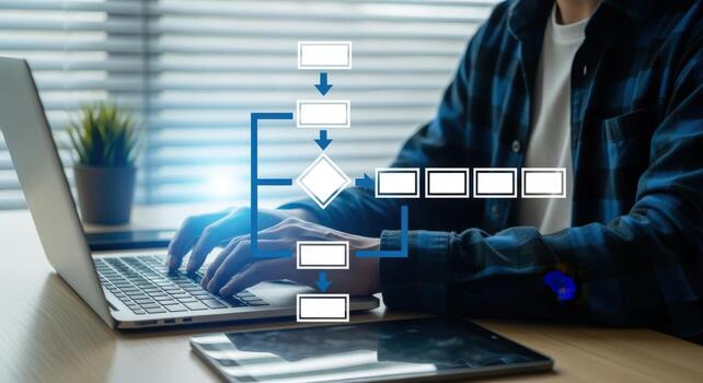 Workflow Process Automation Concept Man Working on Laptop with Digital Flowchart Interface Displayed photo