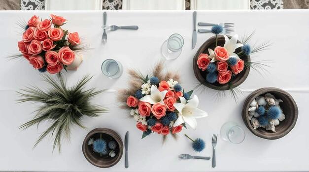 A table with flowers and plates on it photo