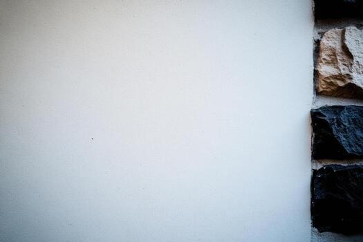 Textured wall featuring smooth and rough surfaces in urban setting photo