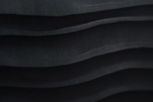 Textured fabric with layered folds creates a captivating visual depth photo