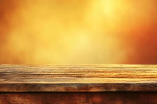 Wooden table against a warm, glowing background during sunset hours photo