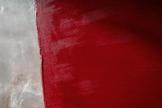 Bold red and neutral surface create striking visual contrast in abstract design photo