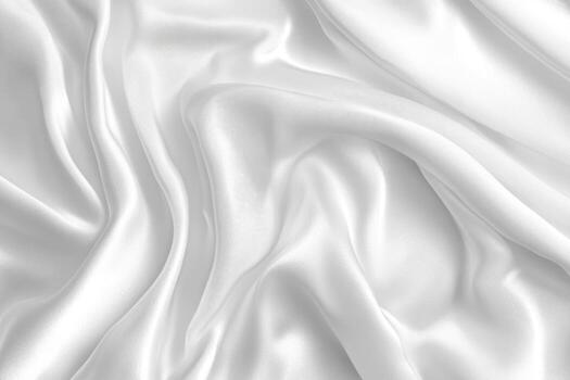 Soft white fabric draped elegantly creating gentle waves and folds photo