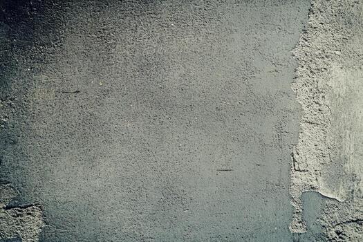 Concrete wall texture showing weathered and rough surfaces in natural light photo
