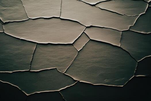 Textured surface reveals cracks and layers of peeling material indoors photo
