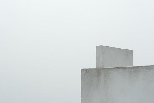 Minimalist architecture creates a captivating contrast against a gray sky photo