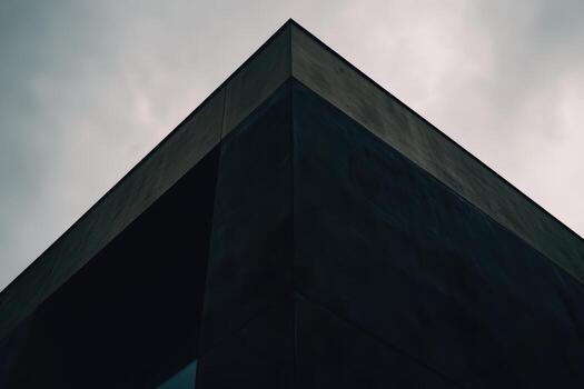 Modern architecture highlighted under cloudy sky with dramatic angles photo