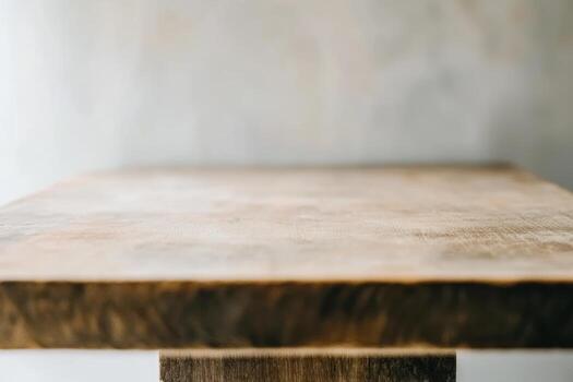 Wooden table with simple design in bright natural light setting photo