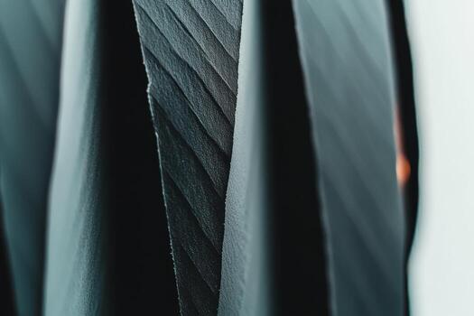 Close-up view of textured black fabric showcasing its unique patterns and folds photo