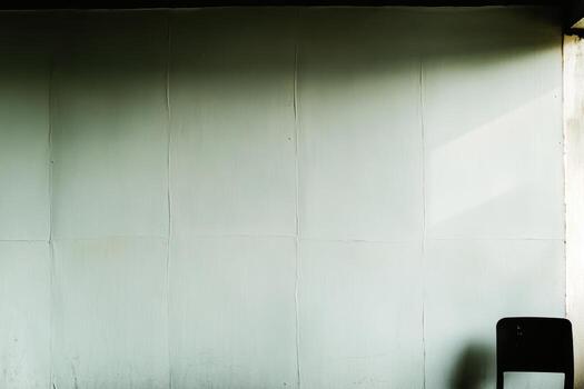 Empty room with a single chair in soft natural light photo