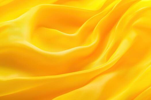 Bright yellow fabric drapes elegantly with smooth, flowing texture photo