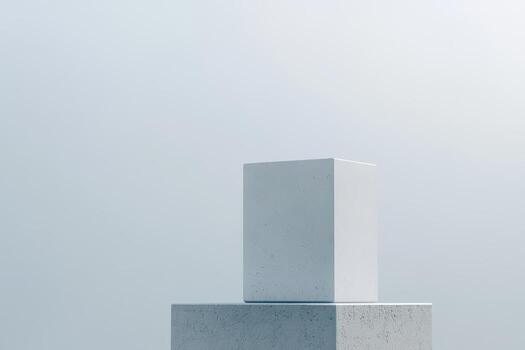 Minimalist cube sculpture on pedestal against pale backdrop in soft light photo
