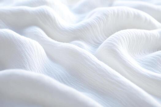Elegant white fabric flowing smoothly in gentle folds and curves photo