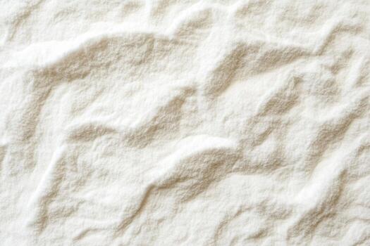 Flour texture close-up on a smooth surface with natural lighting photo