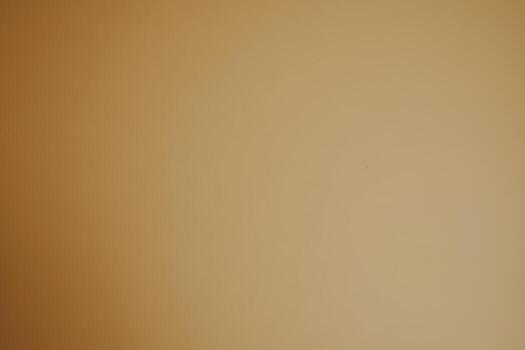Soft beige background showcasing warm tones and subtle texture photo