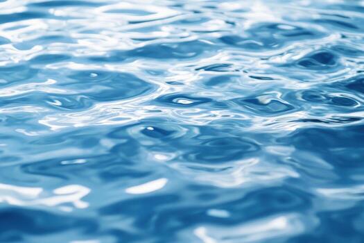 Calm rippling water surface reflecting light in a tranquil setting photo