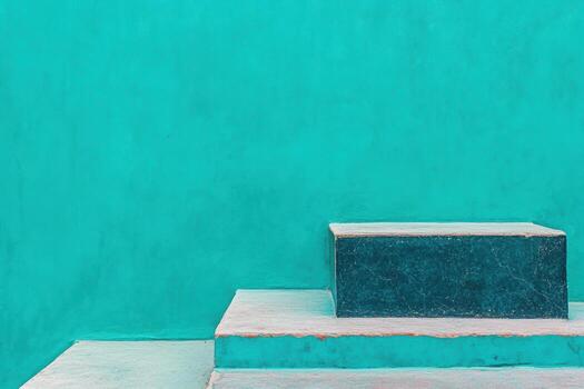 Steps against a vibrant turquoise wall create a striking visual composition photo
