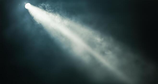 Dramatic Light Beams Illuminating a Dark Space Creating an Atmospheric Effect at Night. photo