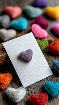 Colorful Felt Hearts on Display With a Note Card in a Creative Arrangement photo
