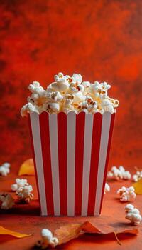 Popcorn Container Filled With Freshly Popped Popcorn on a Vibrant Background photo
