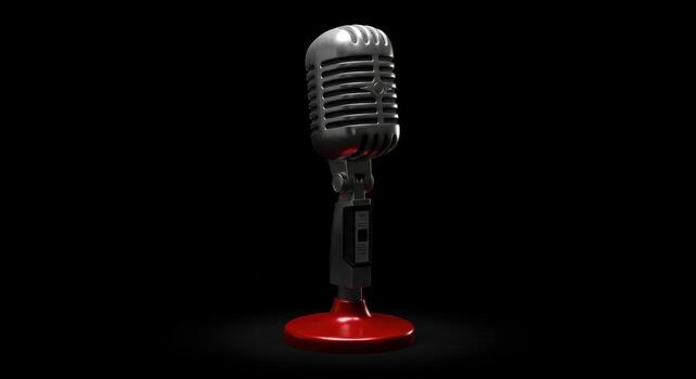 Classic retro microphone with chrome finish and red base on a dramatic black background photo