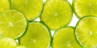 vibrante Lima rebanadas crear un refrescante y brillante antecedentes imagen. foto