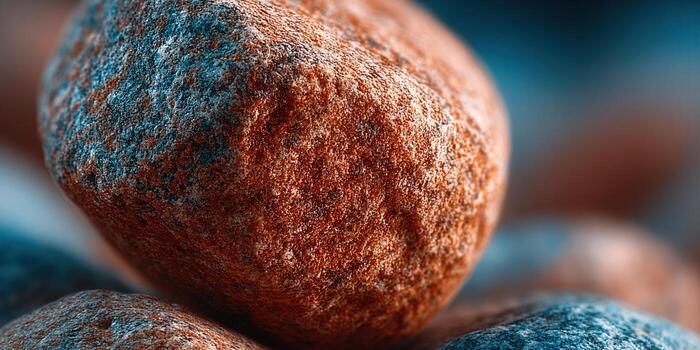 Close-up of a textured stone with intricate details and natural colors. photo